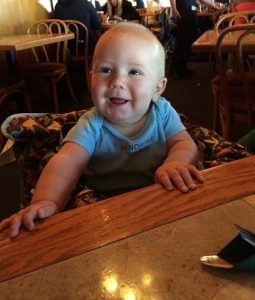 dining at a restaurant with a baby